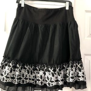 Very unique, boho black skirt with eye catching details.Great, comfy, stylish.